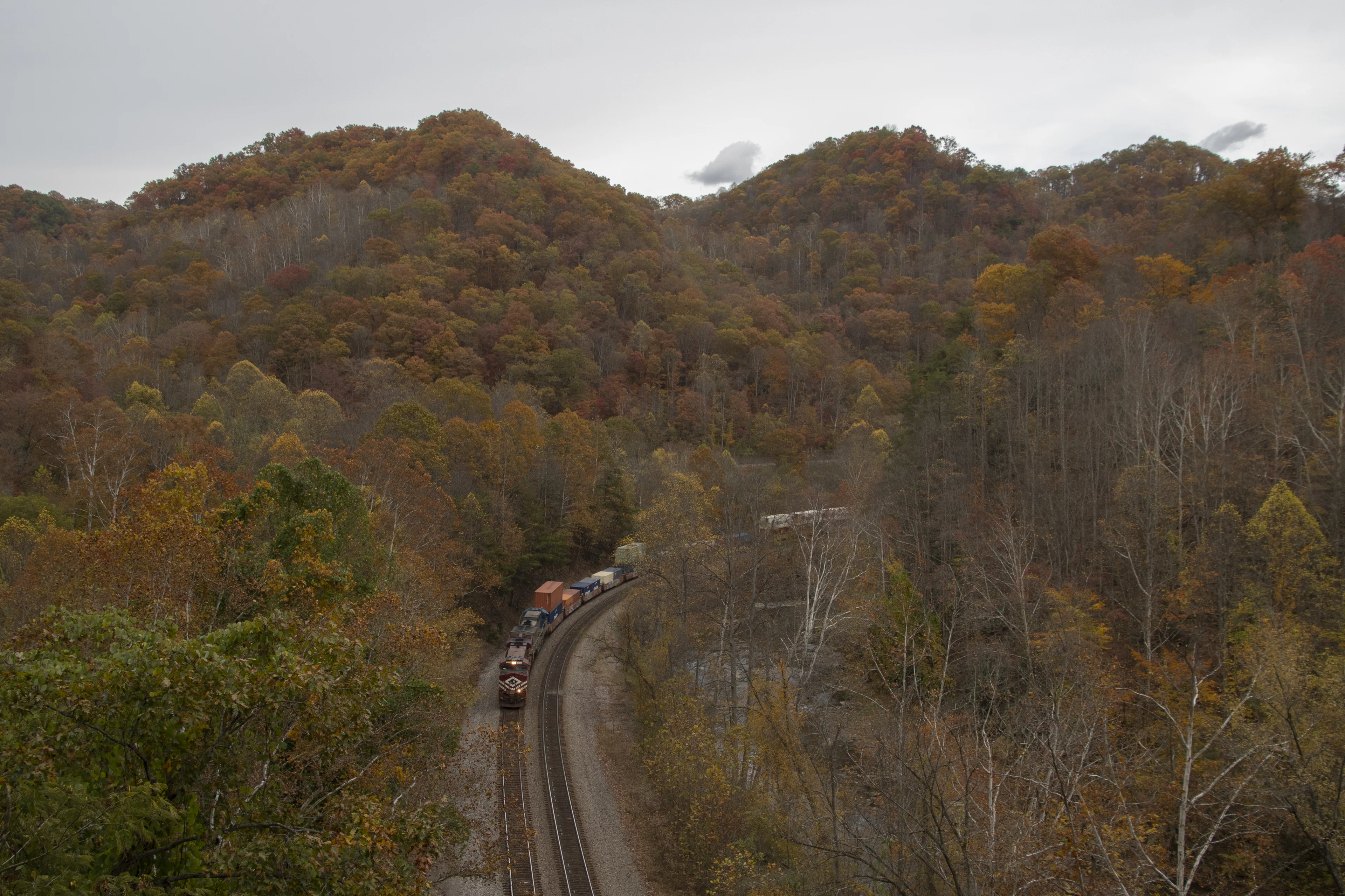 A westbound intermodal with a heritage unit and conversion unit leading at this location